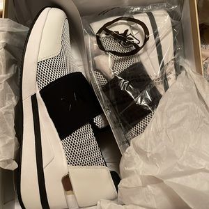Micheal Kors white and black slip on sneakers